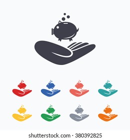 Donation hand sign icon. Hand holds Piggy bank. Charity or endowment symbol. Human helping hand palm. Colored flat icons on white background.