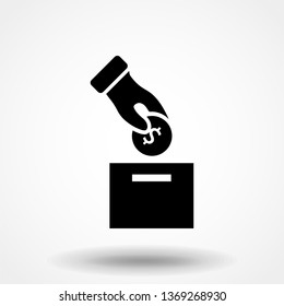 Donation icon concept. Hand putting coin in the box