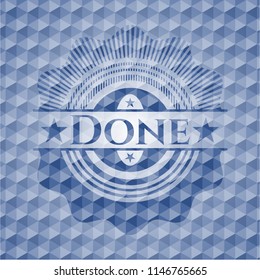 Done blue badge with geometric background.