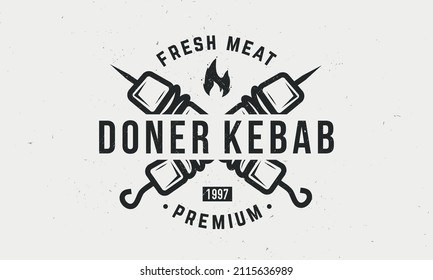 Doner Kebab vintage logo, poster template. Kebab, Shawarma logo with skewer and fire isolated on white background. Retro poster for barbecue, restaurant, grill, kebab cafe. Vector illustration