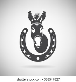 donkey with a horseshoe on a light background