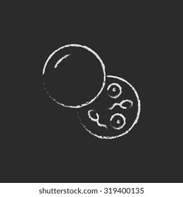 Donor sperm hand drawn in chalk on a blackboard vector white icon isolated on a black background.