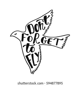 Don't forget to fly. Inspirational quote about freedom. Handwritten phrase in flying bird. Lettering in boho style for tee shirt print and poster. Typographic design.