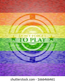 Don't forget to play emblem on mosaic background with the colors of the LGBT flag