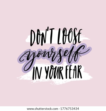 Don't loose yourself in your fear. Inspirational quote about anxiety. Positive motivational saying. Handwritten text on purple background