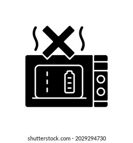 Dont microwave powerbank black glyph manual label icon. Exposure to extreme temperature. Damage to unit. Silhouette symbol on white space. Vector isolated illustration for product use instructions