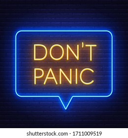 Don't panic neon sign on brick wall background.