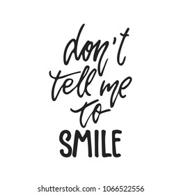 Don't tell me to smile - hand drawn lettering phrase isolated on the black background. Fun brush ink vector illustration for banners, greeting card, poster design