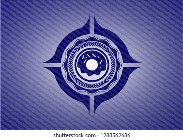 donut icon inside badge with denim texture