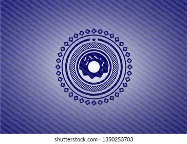 donut icon inside badge with denim texture