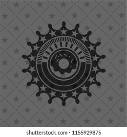 donut icon inside black emblem