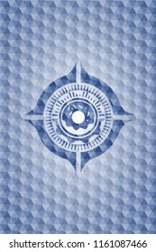 donut icon inside blue badge with geometric pattern.