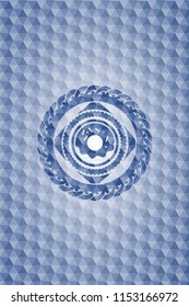 donut icon inside blue emblem with geometric pattern.