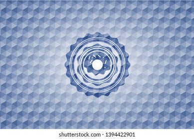 donut icon inside blue emblem or badge with abstract geometric polygonal pattern background.