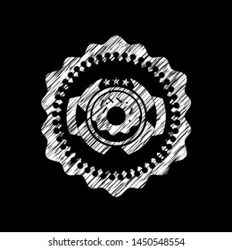 donut icon inside chalkboard emblem on black board