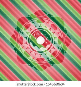 donut icon inside christmas colors style emblem.