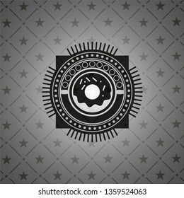 donut icon inside dark emblem