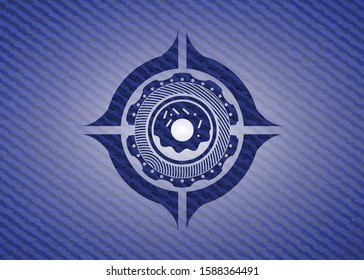donut icon inside emblem with denim texture