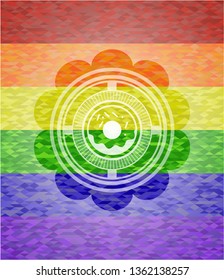 donut icon inside emblem on mosaic background with the colors of the LGBT flag