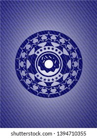 donut icon inside jean or denim emblem or badge background