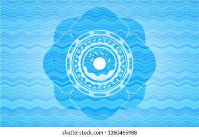 donut icon inside light blue water style emblem.