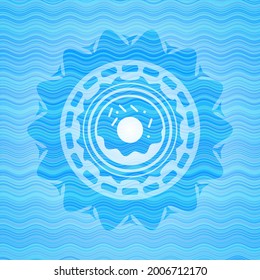 icono de donut dentro del emblema de la ola de agua azul clara. 