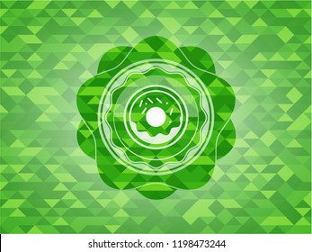 donut icon inside realistic green mosaic emblem