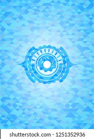 donut icon inside realistic light blue mosaic emblem