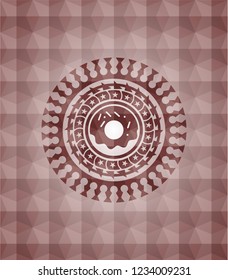 donut icon inside red seamless emblem with geometric pattern background.