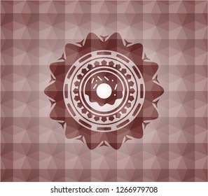 donut icon inside red seamless emblem with geometric pattern.