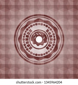 donut icon inside red seamless badge with geometric pattern.