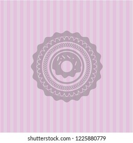 donut icon inside retro style pink emblem