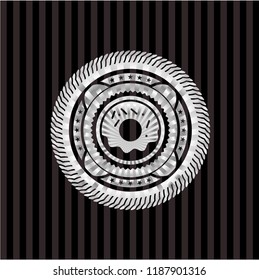 donut icon inside silver emblem