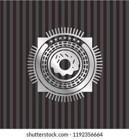 donut icon inside silvery emblem or badge