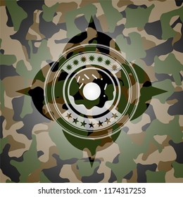 donut icon on camouflaged texture