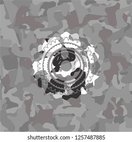 donut icon on grey camouflaged pattern