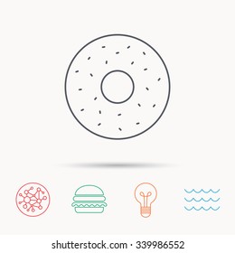 Donut icon. Sweet doughnuts sign. Breakfast dessert symbol. Global connect network, ocean wave and burger icons. Lightbulb lamp symbol.