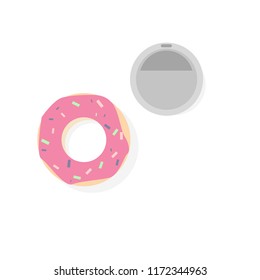 Donut with pink icing with a glass of coffee on a white background.