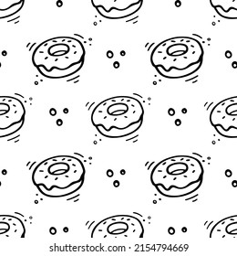 Donut seamless pattern. Hand drawn Sketch of doughnut. Fast food illustration in doodle style. Donut illustration.