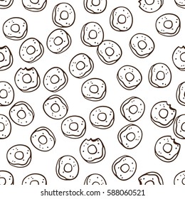 Donut seamless pattern hand drawn illustration. Can be used for t-shirt, banner, card and other design projects.