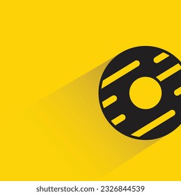donut with shadow on yellow background