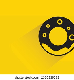 donut with shadow on yellow background