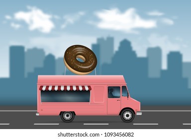 Donut truck on the blurred city background. Backdrop for banner, brochure, flyer, advertising booklet.