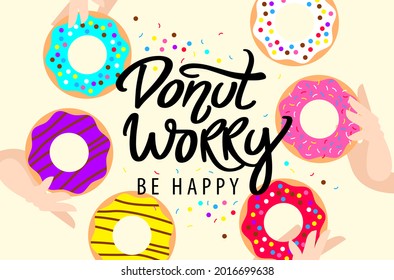 Donut worry be happy. Hand written lettering. Arms holding colored glazed donuts and colorful sprinkles. Vector modern brush calligraphy.