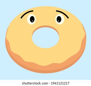 Donut with yellow glaze and eyes. Funny donut. On a blue background. Food, dessert and sweets. Donut day.