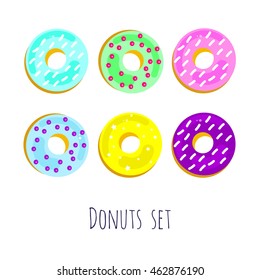 donuts colored violet green yellow blue pink with stars with sprinkles and and glazed