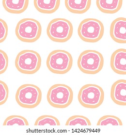 Donuts seamless pattern on white background. Cute sweet food baby background. Colorful design for textile, wallpaper, fabric, decor. 