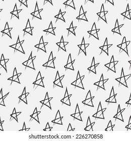 Doodle abstract pattern with stars. Black and white colors. Seamless pattern can be used for wallpaper, pattern fills, web page background,surface textures.