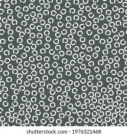 doodle abstract seamless pattern irregular chaotic white circles on contrasting background