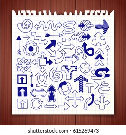 Doodle arrow symbols set. Graphic design elements hand drawn with blue pen on note paper. Line art style icons for web site, mobile app, infographics, scrapbooking. Vector illustration